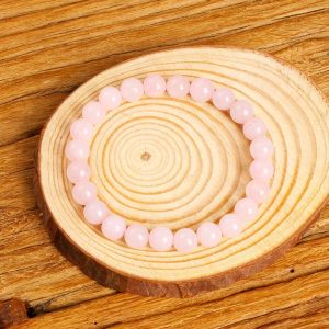 Pulsera de cuarzo rosa con cuentas pulidas para manifestar amor propio y sanar el chakra corazón